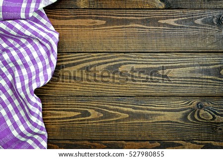 Tablecloth on wooden background
