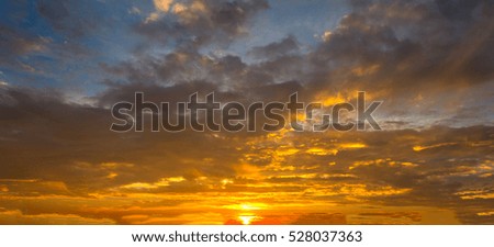 panorama Sunlight with dramatic sky on dark background. Vivid sky on dark background. 