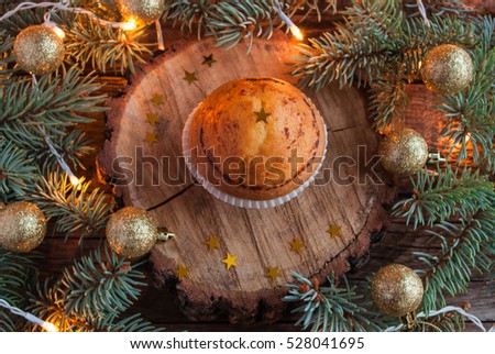 Christmas Cupcakes on Wooden Background. Horizontal.