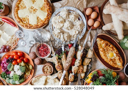 a lot of food on the table. Georgian cuisine. top view. Royalty-Free Stock Photo #528048049