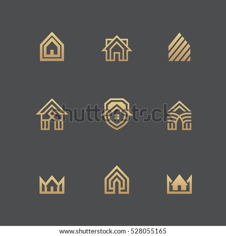 Houses icons and logo templates set in golden colors isolated on black background.