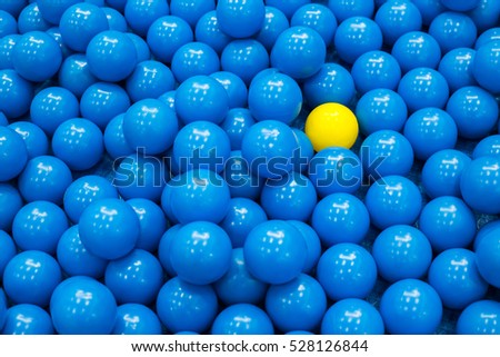 close up of plastic colorful blue ball at the playground