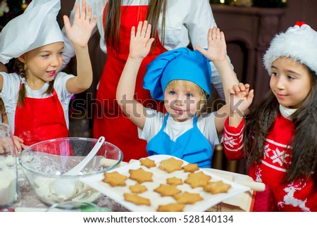 kids baking christmas cookies before the celebration of Christmas. Family