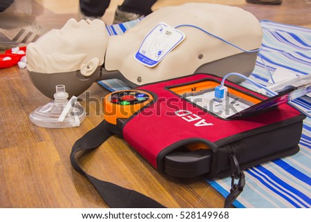 cpr with aed training and blur background Royalty-Free Stock Photo #528149968