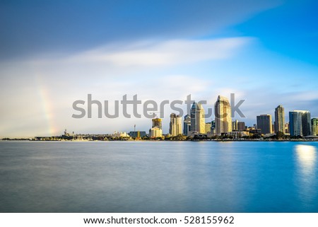 San Diego skyline from Coronado Island at sunrise with rainbow