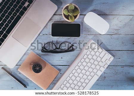 Looking for direction and inspiration, Business working at an office, Office desk table with computer, supplies, flower. Top view. Copy space for text, vintage