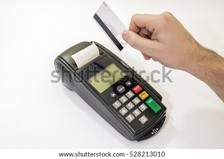 Male hand dials pin code on pin pad of card machine or pos terminal with inserted blank white credit card isolated on white background. Payment with credit card - businessman holding pos terminal. 