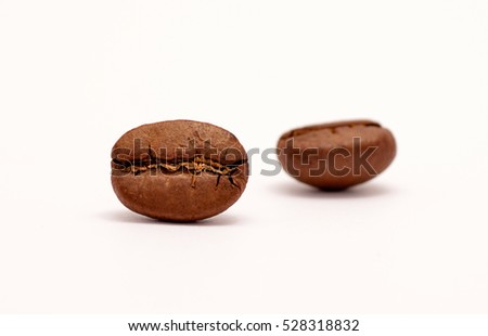 close up a coffee beans over white background