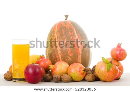 Autumn nature fruits concept. Fall fruits and orange juice, on a white background, studio picture