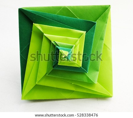 Green origami Royalty-Free Stock Photo #528338476