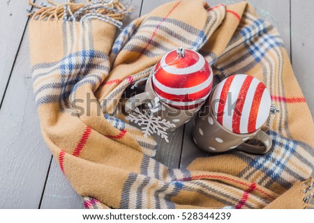 closeup photo of warm sweater with mug