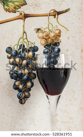 large gourmet, glasses of red wine background grape cluster decorated ,on background decorated with drawing free hand, front view   , photo cropping  