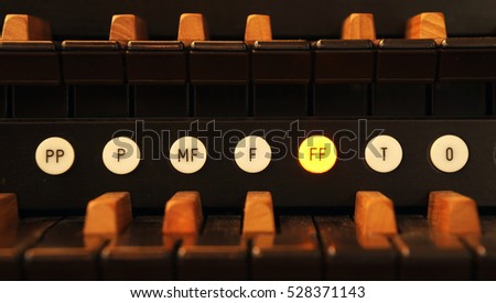 Pipe organ has many buttons to express the articulation. (selective focus)