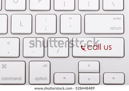 Call us word written on computer keyboard.