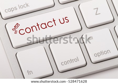 Contact us word written on computer keyboard.