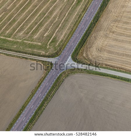 Aerial view over fields and roads