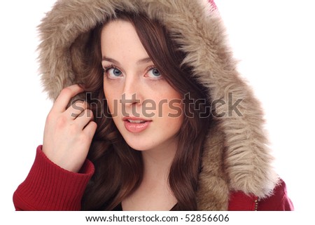 Teenager with furry hood on white background
