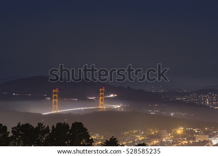 Mist in Golden Gate Bridge at night, San Francisco, California.