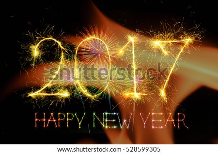 HAPPY NEW YEAR 2017 from colorful sparkle on black background