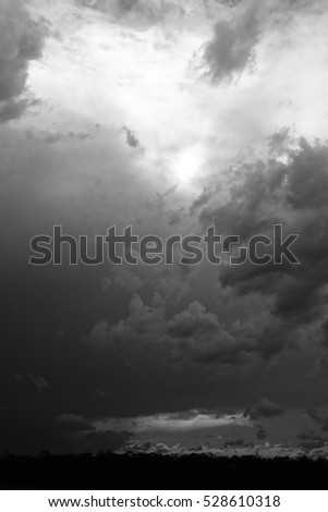 A black and white photograph of a cloudy sky at Lake Kurwongbah in Brisbane, Australia.