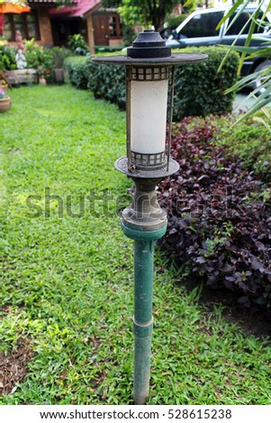 Lamp in garden background