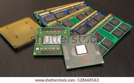 Some CPUs and RAM on a brushed, metallic underground