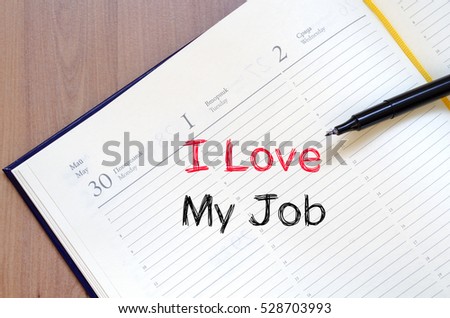 I love my job text concept write on notebook