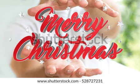 Businessman on blurred background holding floating christmas message in his hand 3D rendering