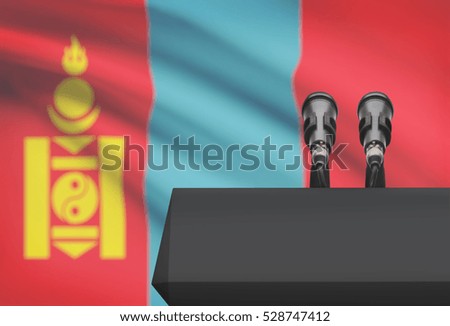 Pulpit and two microphones with a flag on background - Mongolia