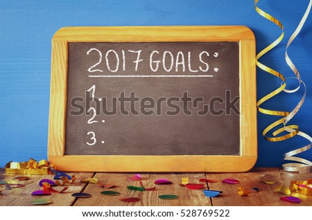 Top view 2017 goals list written on blackboard