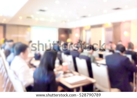Blur image of conference room use for background.