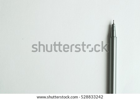 pen on white paper background