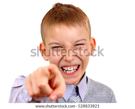 Kid pointing at You Isolated on the White Background Royalty-Free Stock Photo #528833821