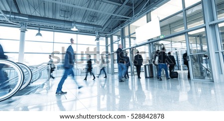 Blurred business people at a Trade Show Convention