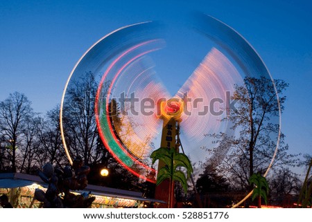 Light attraction at night in funny park