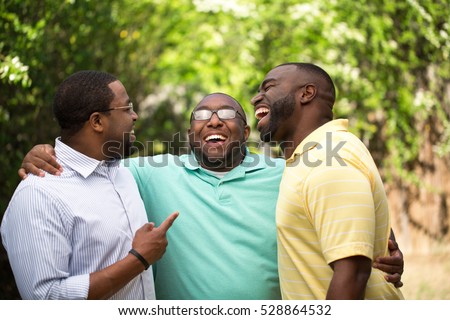 Brothers laughing and having fun. Royalty-Free Stock Photo #528864532