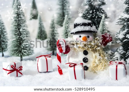 Snowman in the pine forest with snow