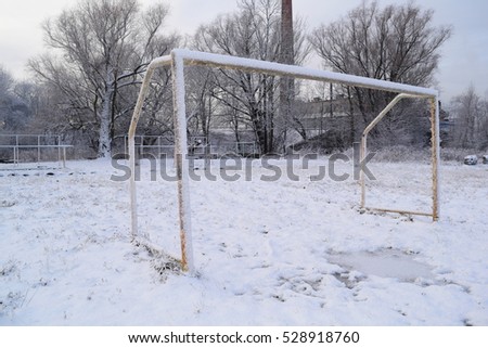 view of a football goal in the winter