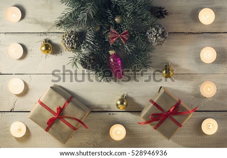 Christmas New year composition with candles on the old wooden background.Top view