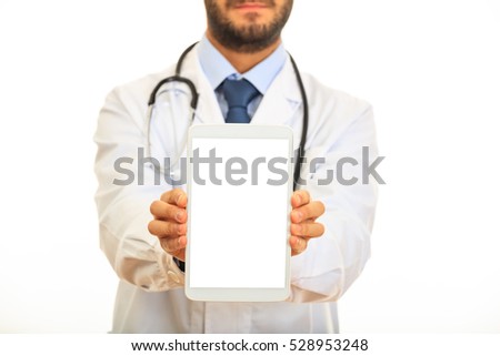Doctor presenting a tablet on white background