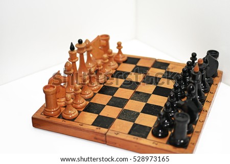 Abstract composition of chess figures. Isolated on white background.