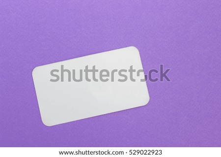 Blank white business cards on color background. 