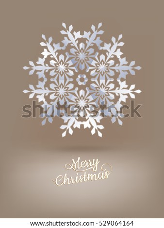 White paper christmas snowflake on a light brown background. EPS 10 vector file included