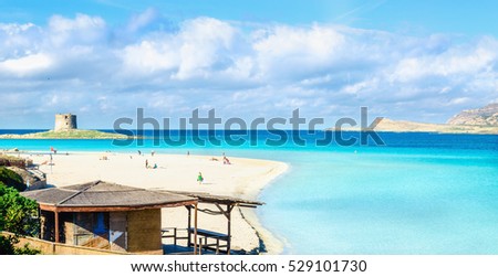 One of the most beautiful sandy beaches of the Mediterranean, La Pelosa, Stintino, Sardinia, Italy Royalty-Free Stock Photo #529101730