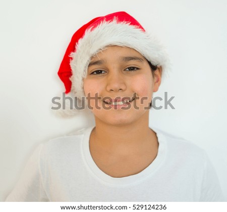Christmas time - boy with Santa Claus Hat