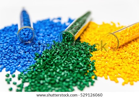 Polymeric dye. Plastic pellets. Colorant for plastics. Pigment in the granules. Royalty-Free Stock Photo #529126060