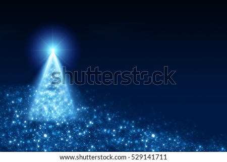 Shining Christmas tree with beautiful  star and circle bokeh or glitter lights. Blue festive background
