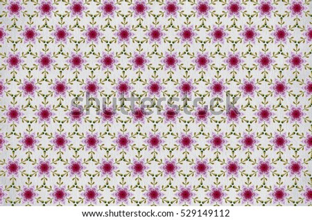 Seamless floral background of embroidered pink red cloves on white cotton cloth.
