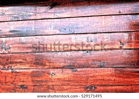 Wood coated with lacquer.