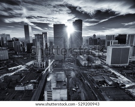 Aerial/Drone photo.  Black and white image of the capital city of Denver Colorado at sunset